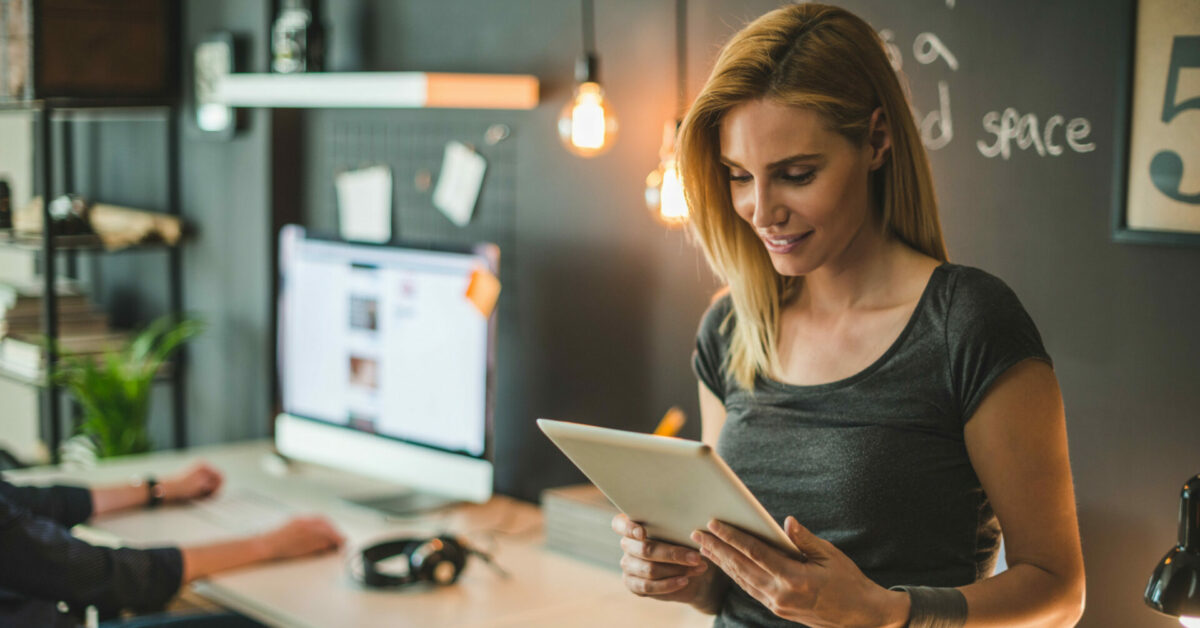 A woman uses Sortly's asset management system.