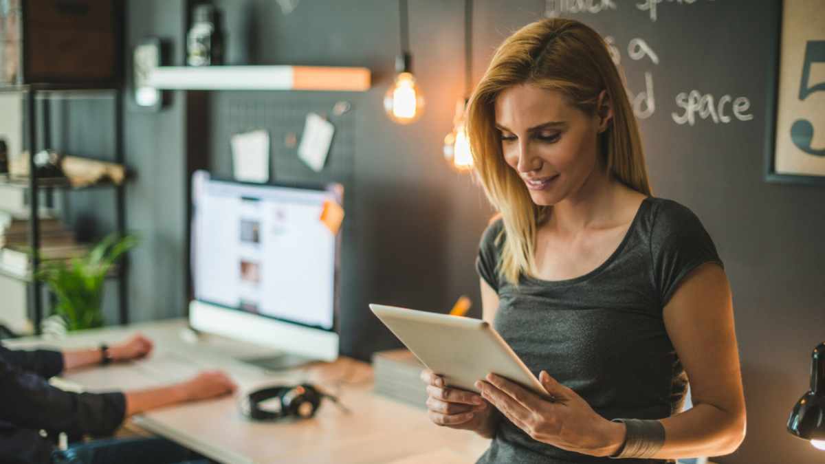 A woman uses Sortly's asset management system.