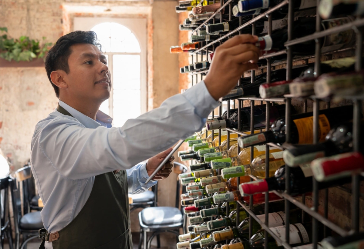 An employee keeping tracking of inventory.