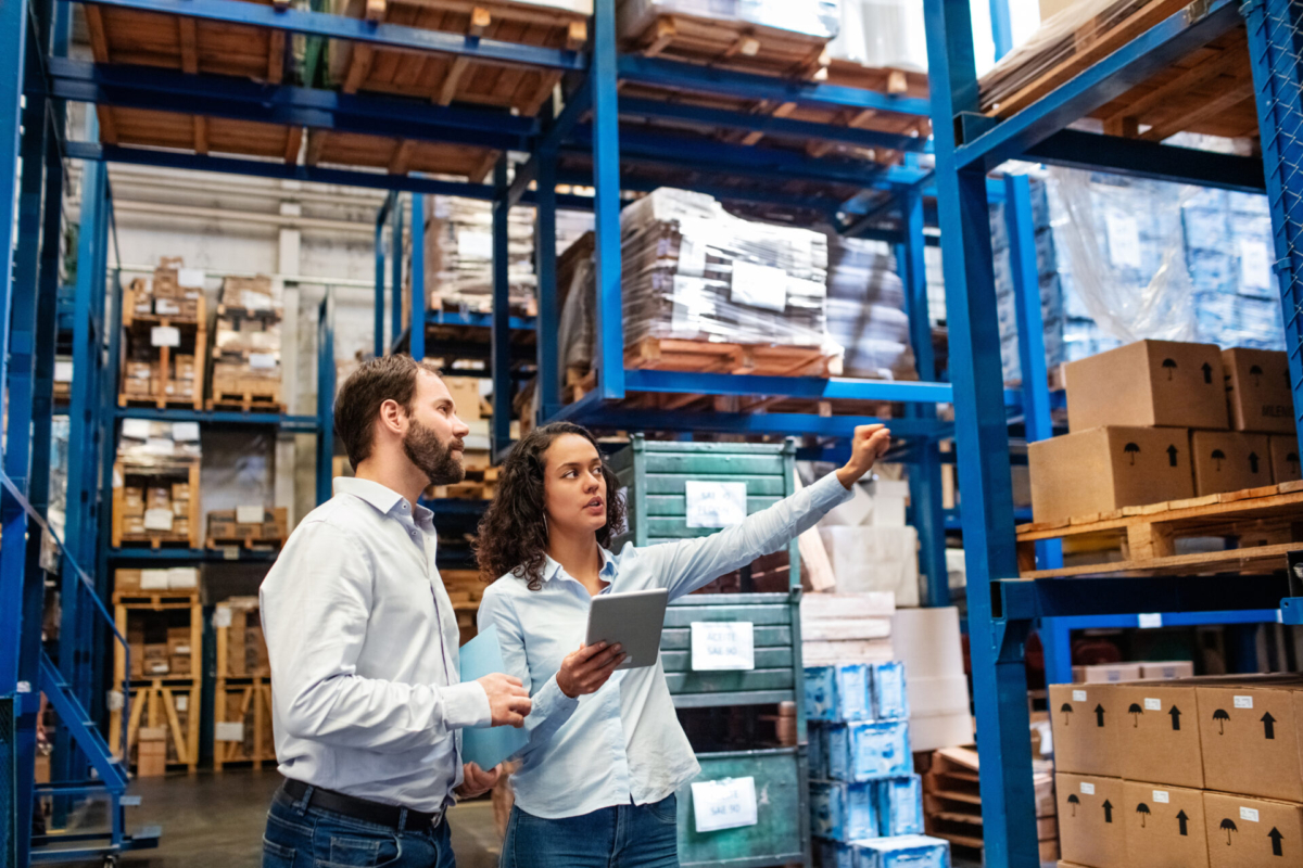 employees in warehouse practicing multi-echelon inventory optimization (MEIO)