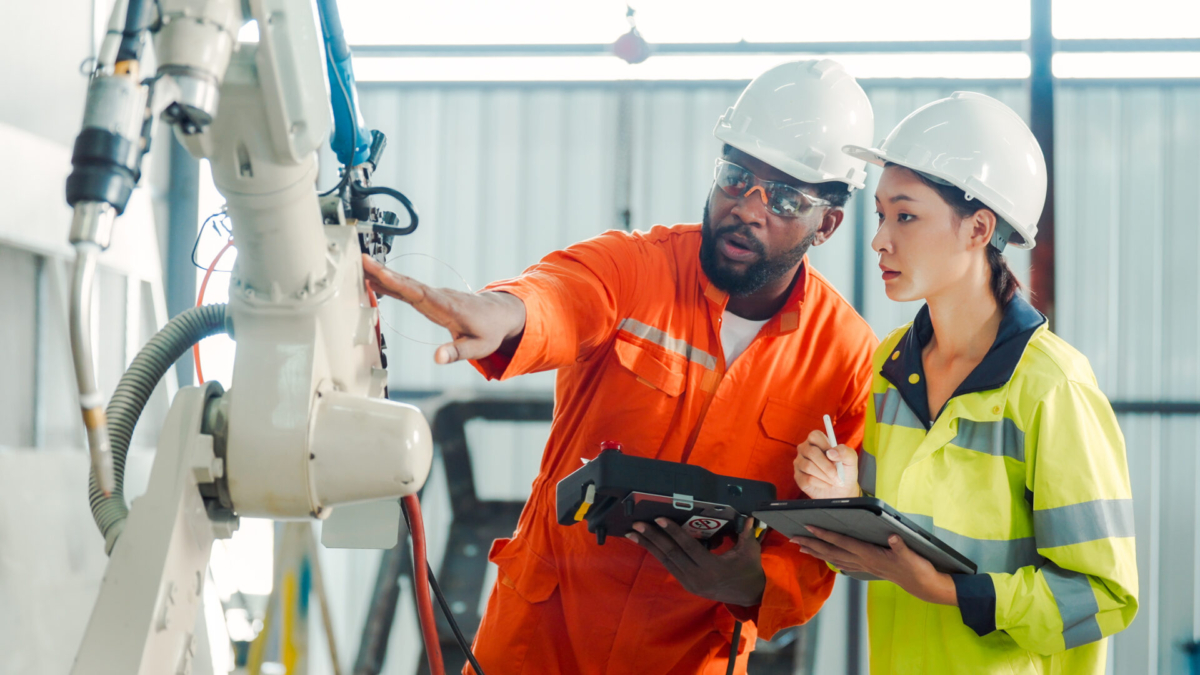 Manufacturing employees working on manufacturing efficiency