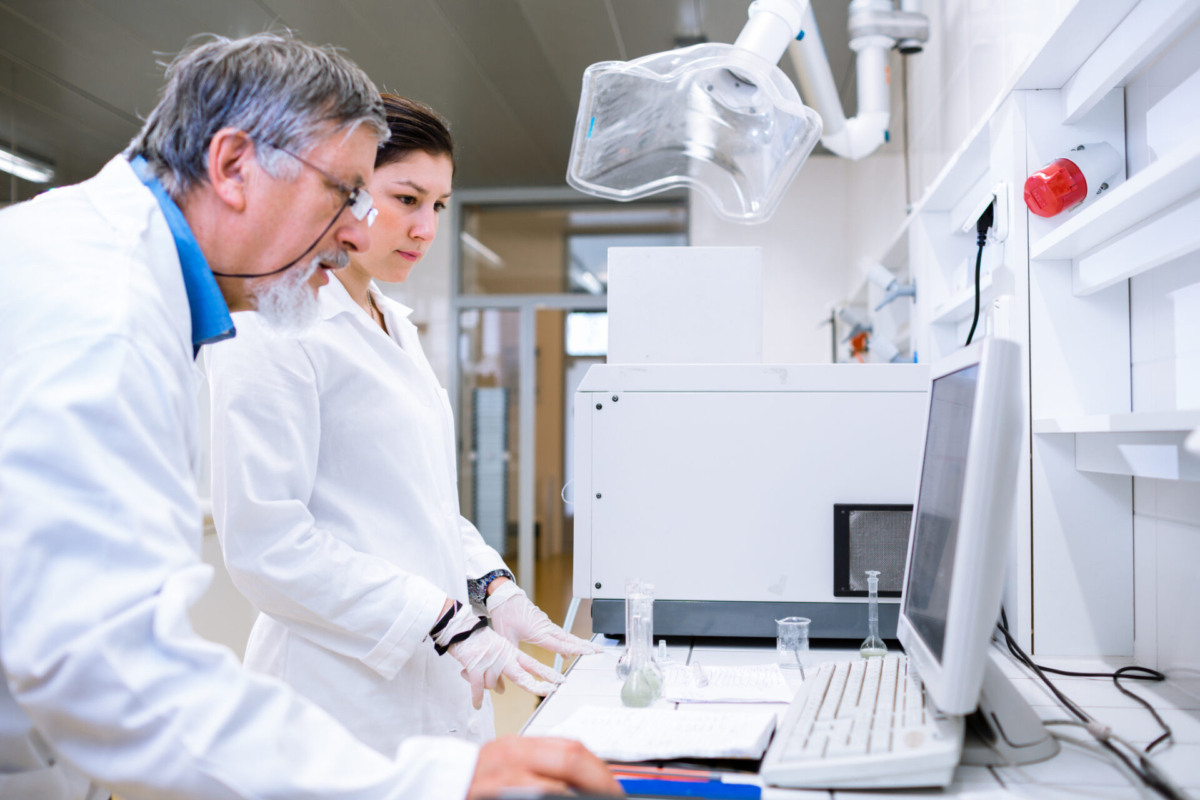 Two doctors working on medical inventory compliance with medical equipment
