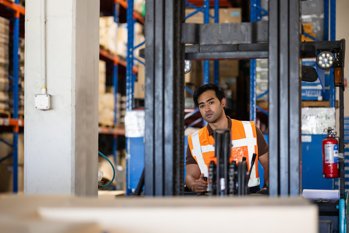 Warehouse employee practicing MRO inventory optimization