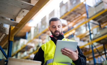 Inventory metrics are viewed in a warehouse.