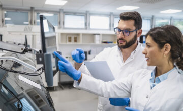 Employees manage healthcare assets in a hospital setting.