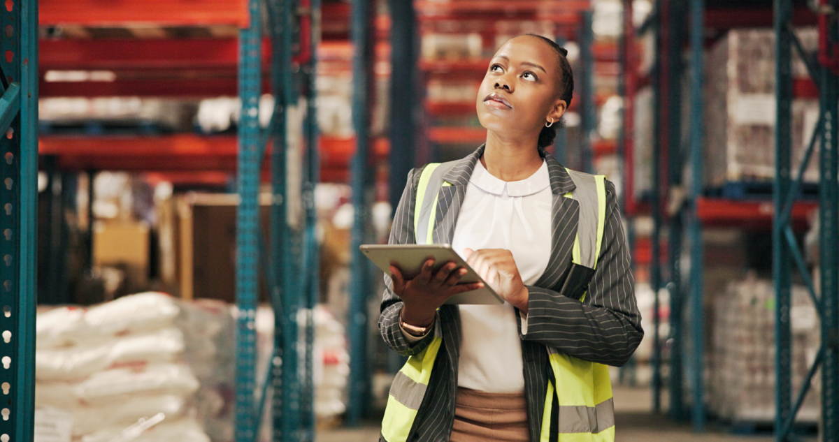 A woman checks safety stock levels.