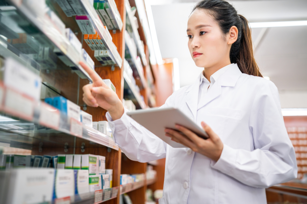 A woman practices healthcare inventory management.