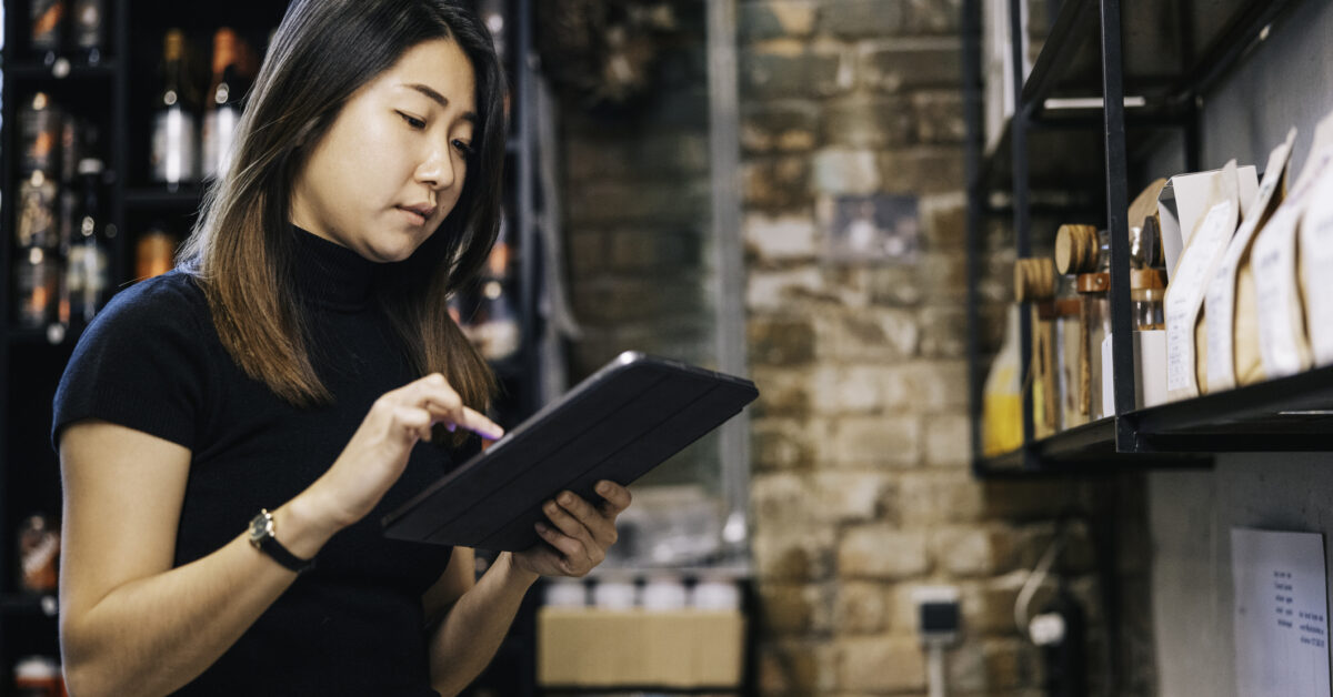 An employee manages an inventory database.