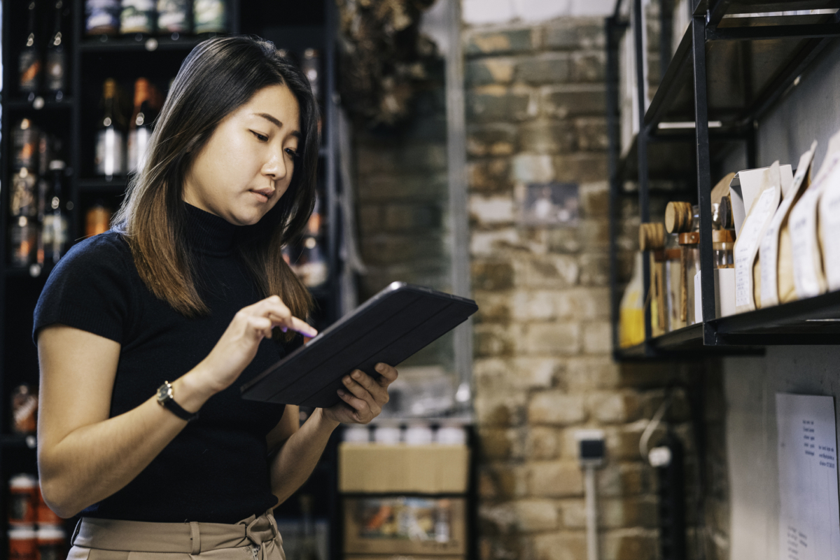 An employee manages an inventory database.