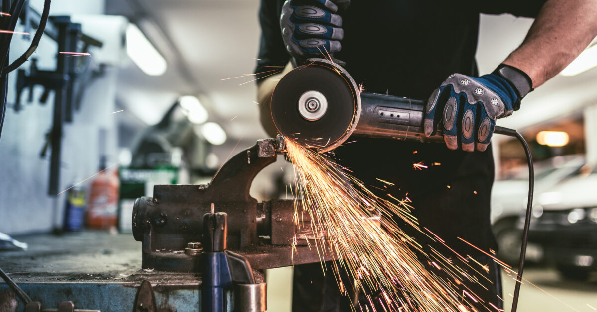 A man using an angle grinder
