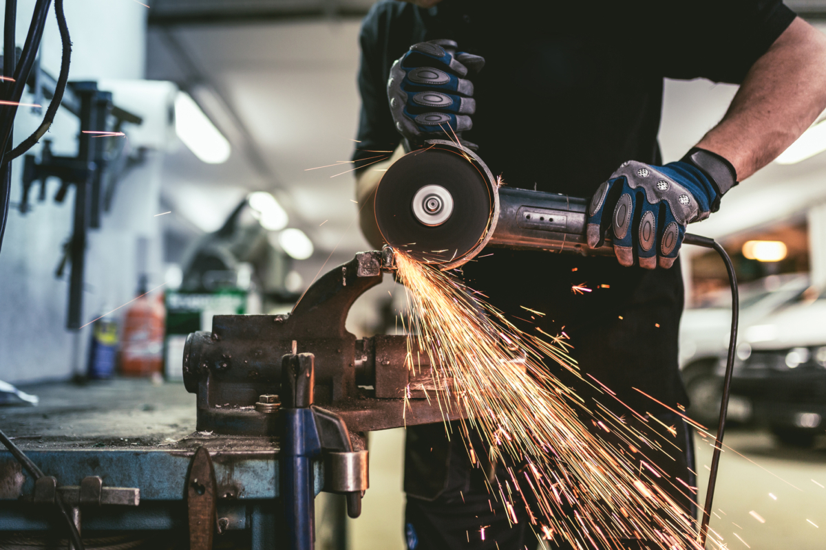 A man using an angle grinder