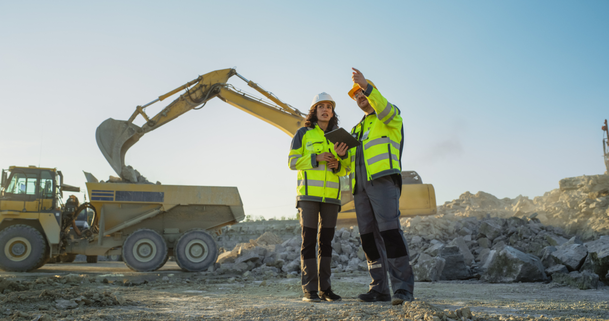 Two construction employees on remote job site