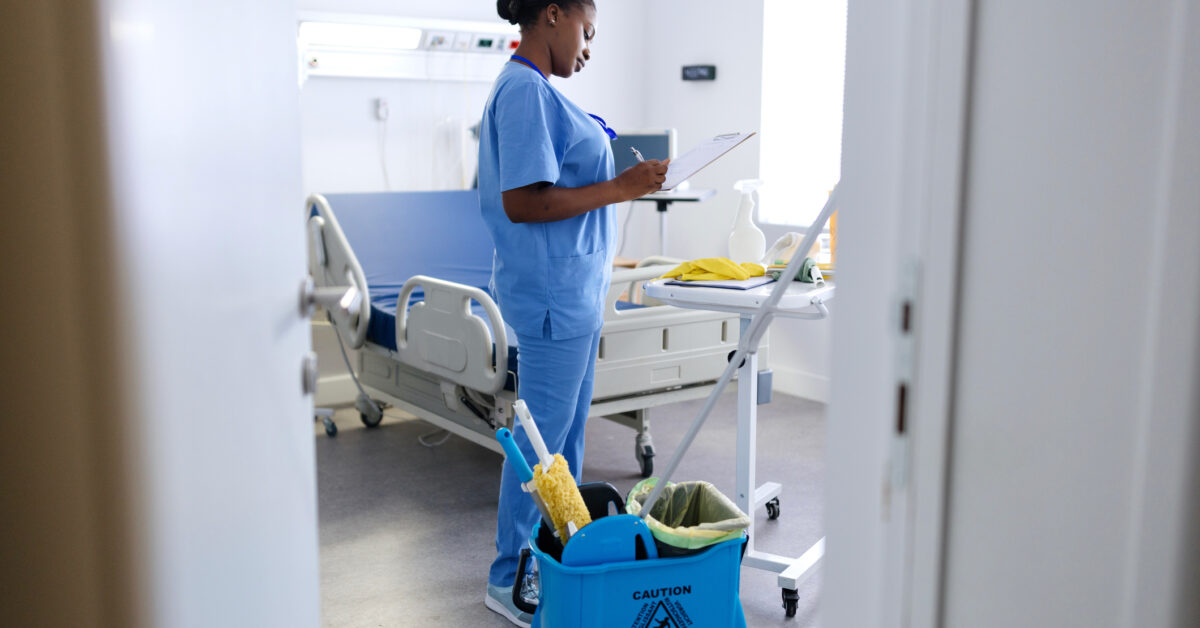 MRO inventory management software is used by a janitorial staff member.
