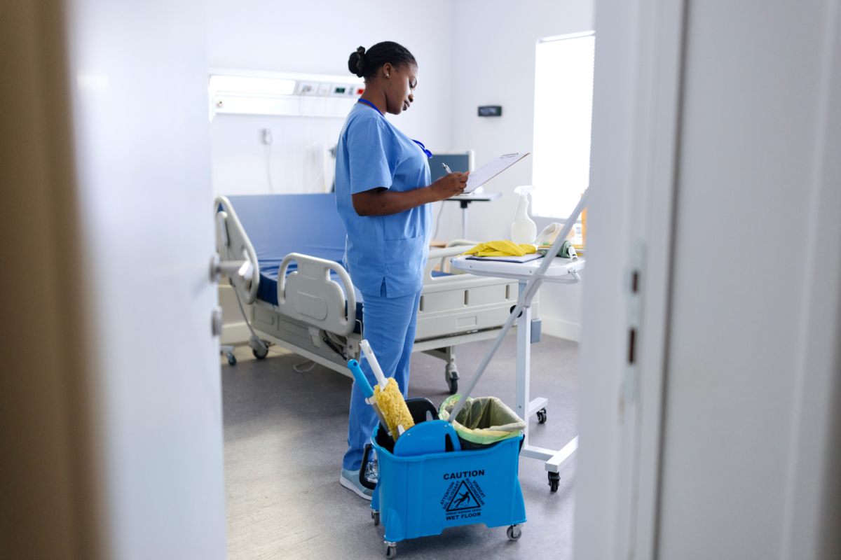 MRO inventory management software is used by a janitorial staff member.