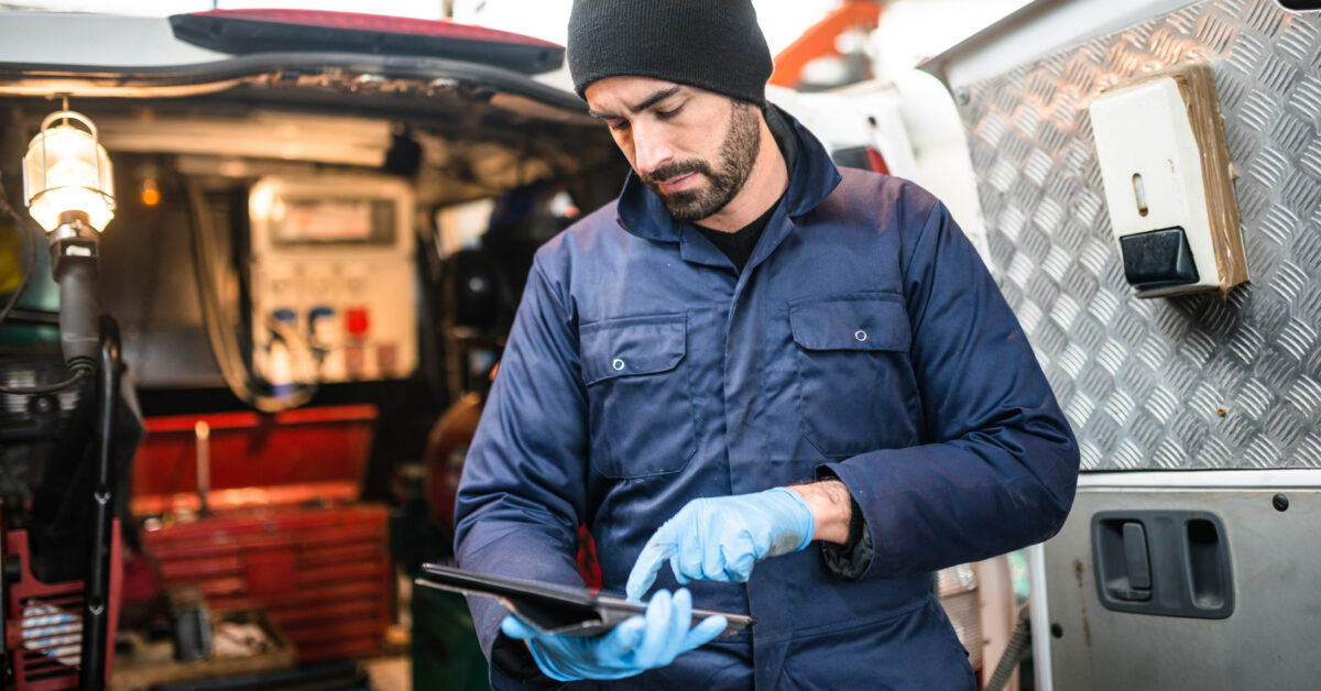 field technician using AI on tablet
