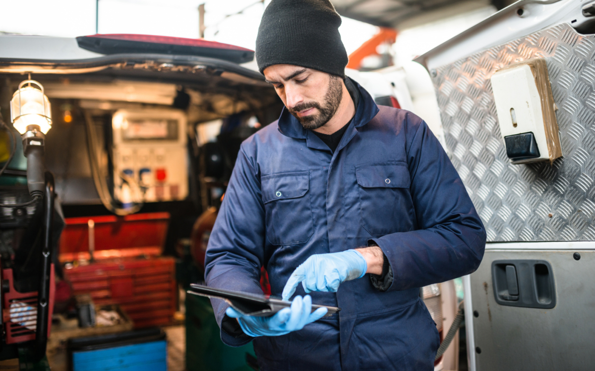 field technician using AI on tablet