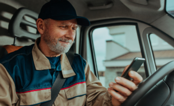 A technician practices service truck inventory management on his phone.