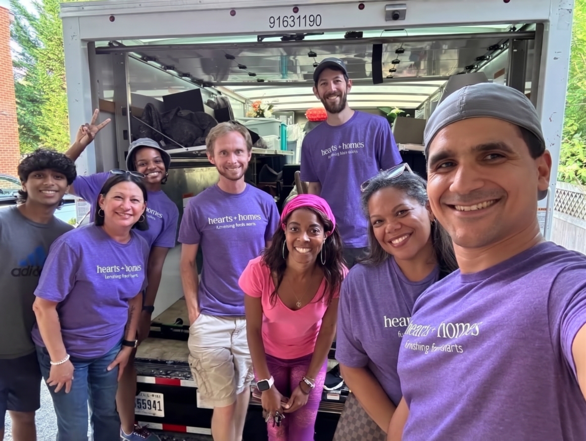 hearts+homes volunteers smiling